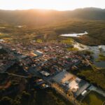 Stunning aerial view of Encanto, RN, Brazil with hills and lakes at sunset.