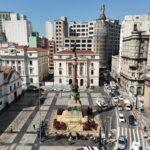 Aerial view of Praça da Sé in São Paulo city featuring historic architecture and a central monument.
