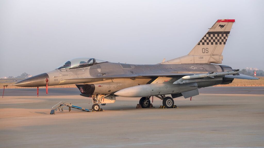A sleek fighter jet stationed at an airbase in Bengaluru, showcasing advanced aviation technology.