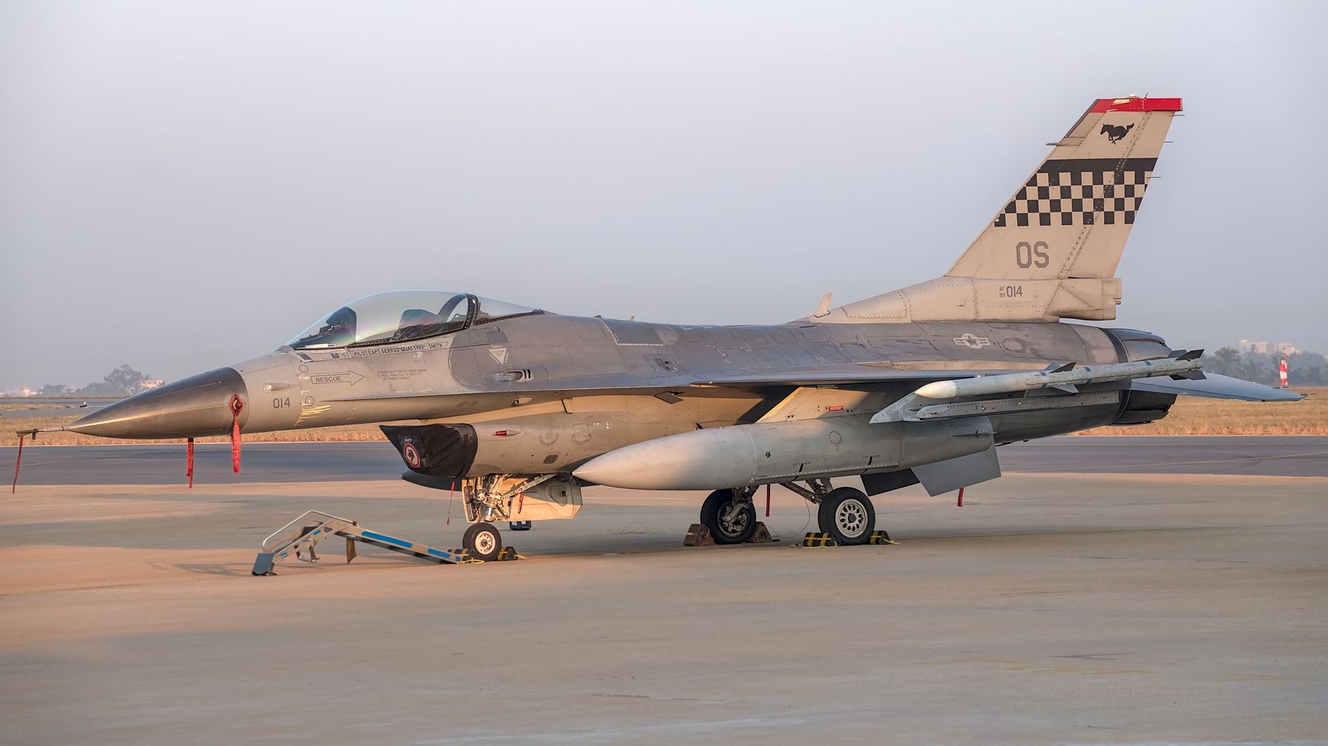 A sleek fighter jet stationed at an airbase in Bengaluru, showcasing advanced aviation technology.