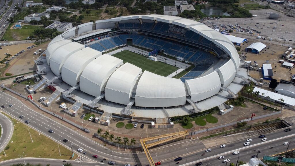 Aerial shot of Arena das Dunas stadium in Natal, Brazil, showcasing its modern architecture.