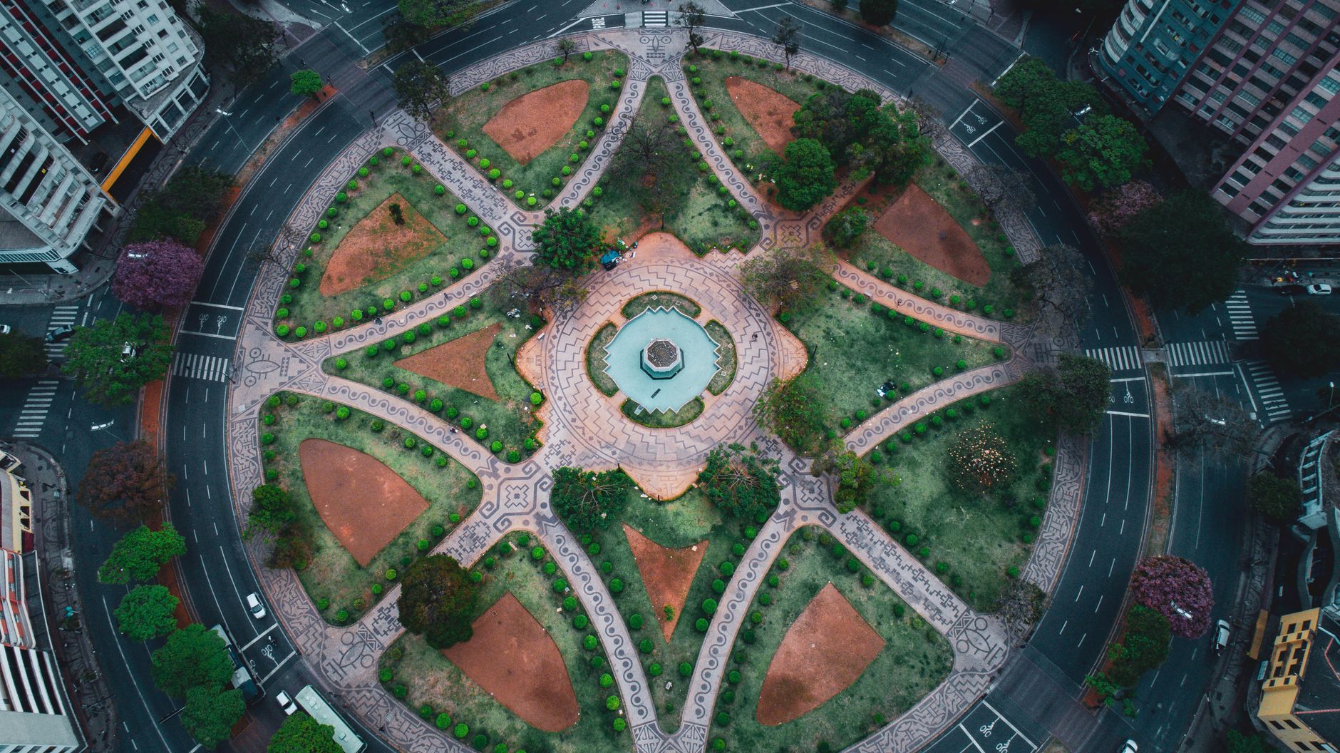 Stunning aerial shot of Praça da Liberdade in Belo Horizonte, showcasing its circular design and urban landscape.
