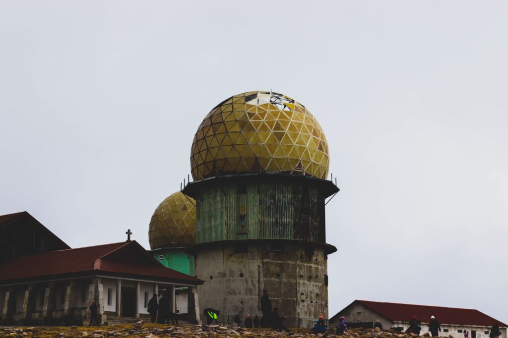 Stunning geodesic dome observatory in Guarda, Portugal under overcast skies.