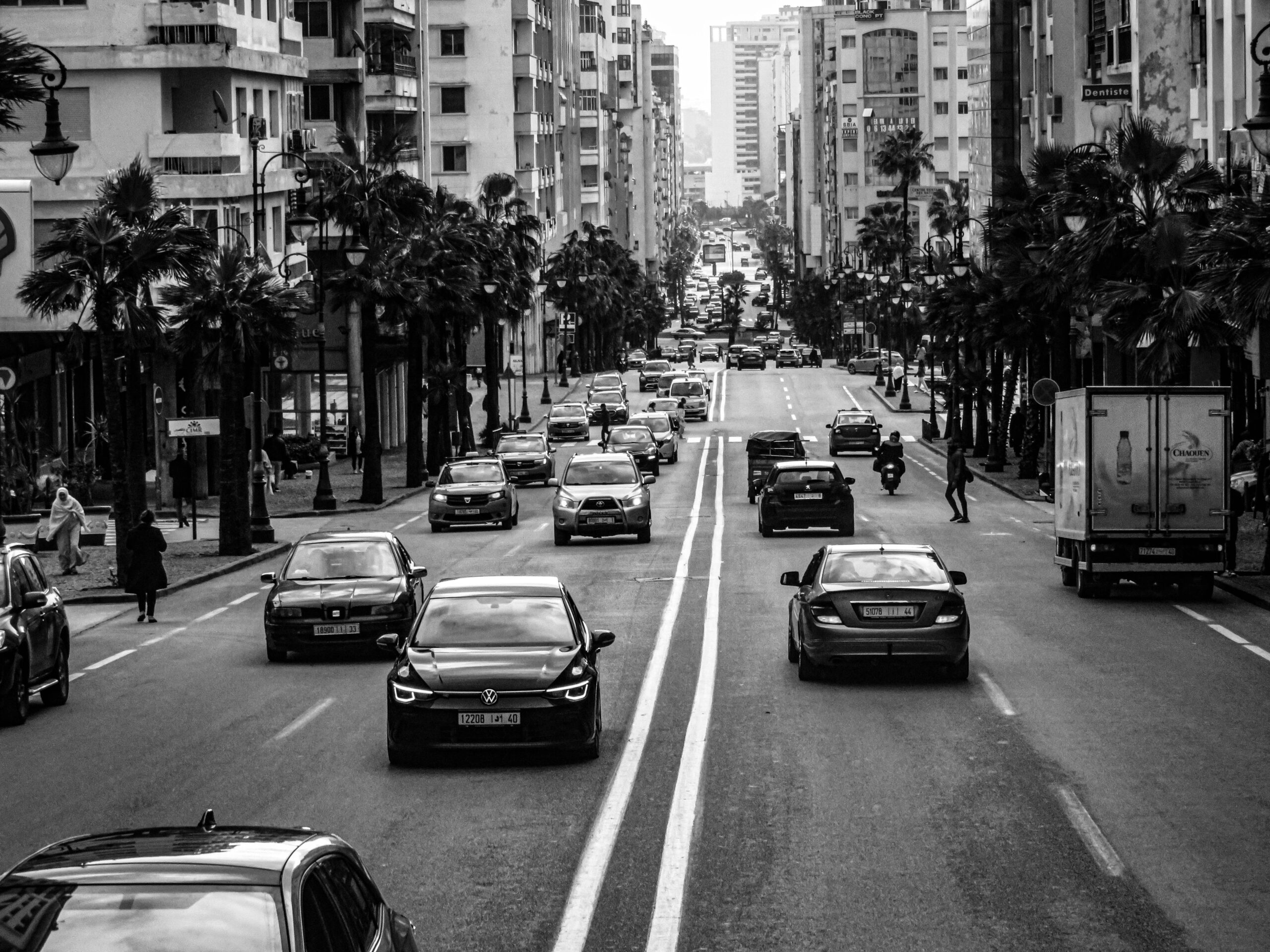 a city street filled with lots of traffic