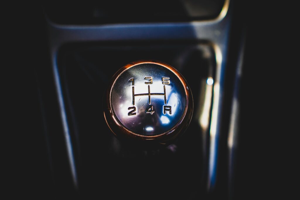 black and gray automatic vehicle gear shift lever
