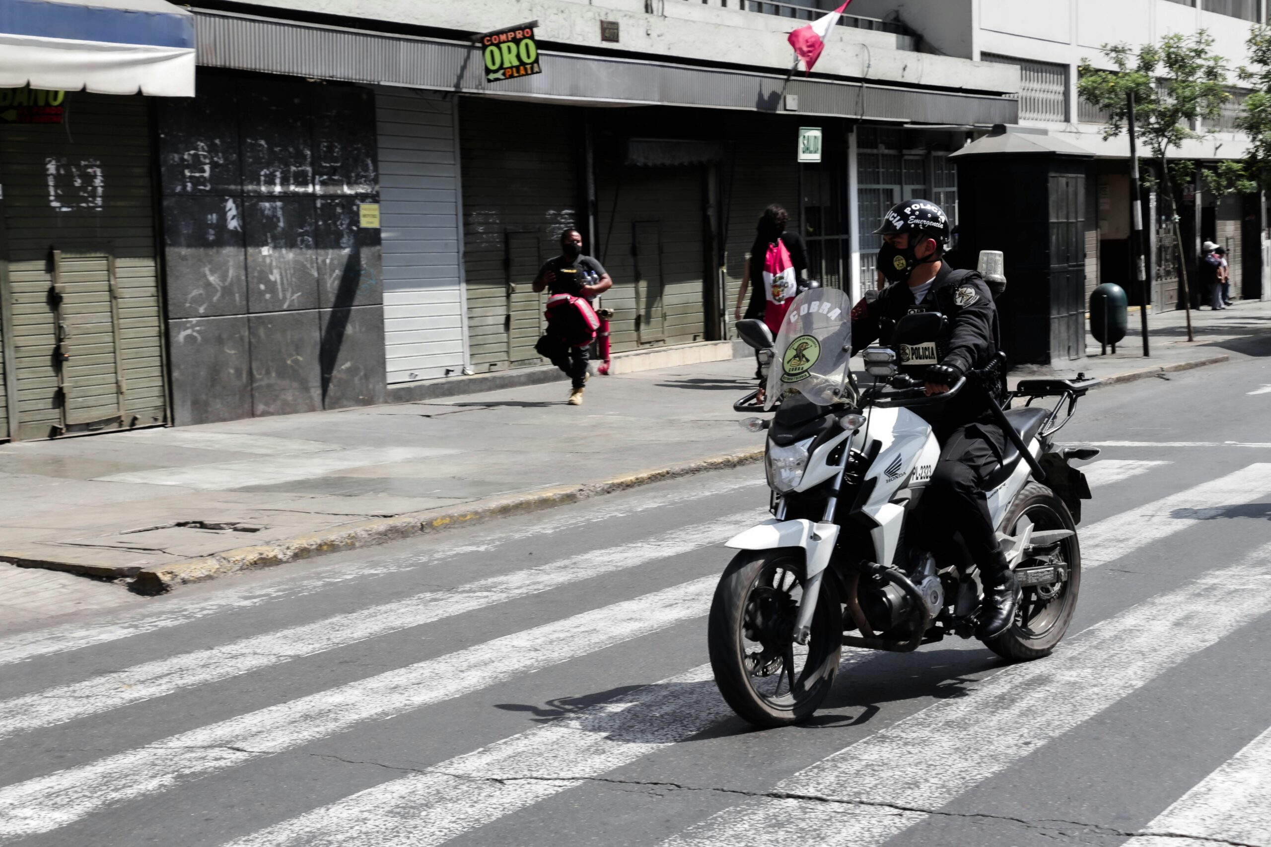 people riding motorcycle on road during daytime